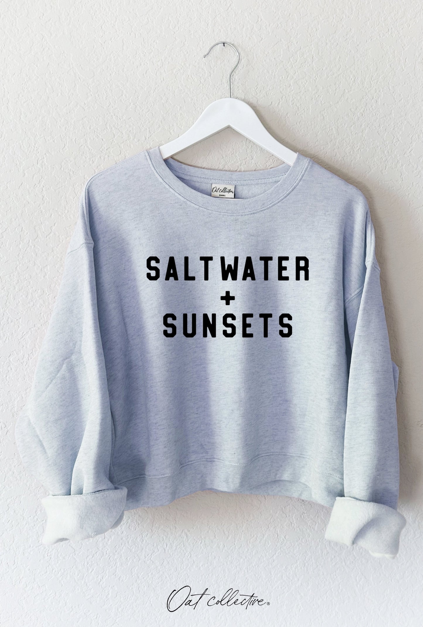 Salt Water and Sunsets Mid Graphic Sweatshirt (Light Blue color) - by OAT COLLECTIVE