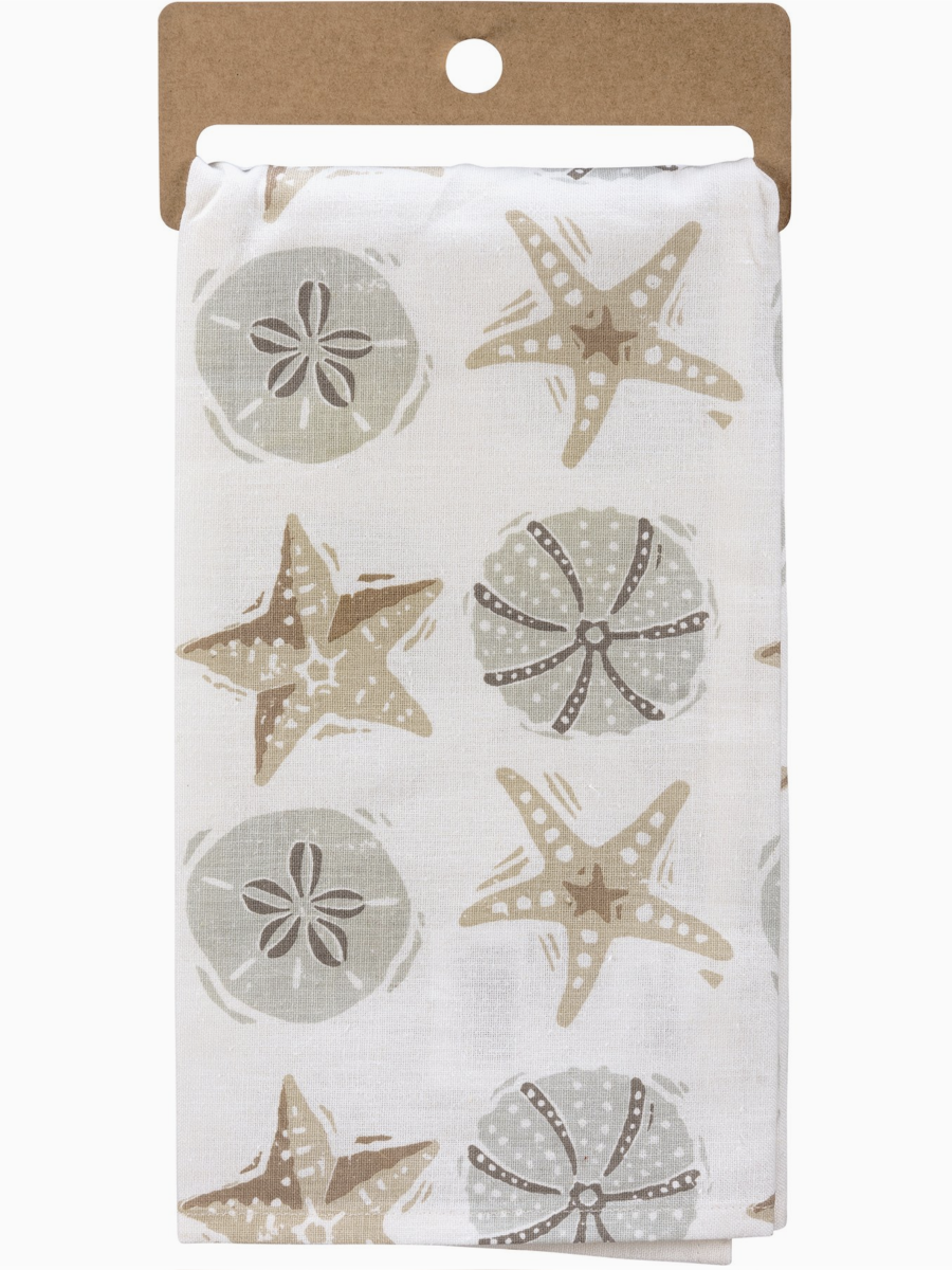 White kitchen towel with tan starfish and sand dollar illustrations and the text "Sandy Hugs & Salty Kisses" in the corner.