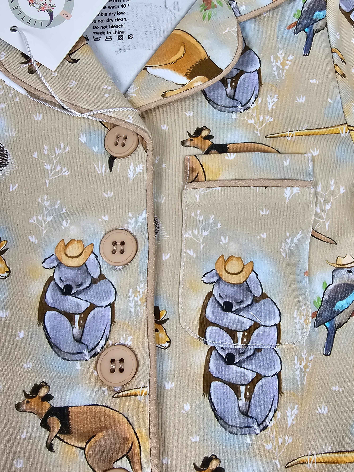 Pajamas Shirt with koala and kangaroo design on a beige background