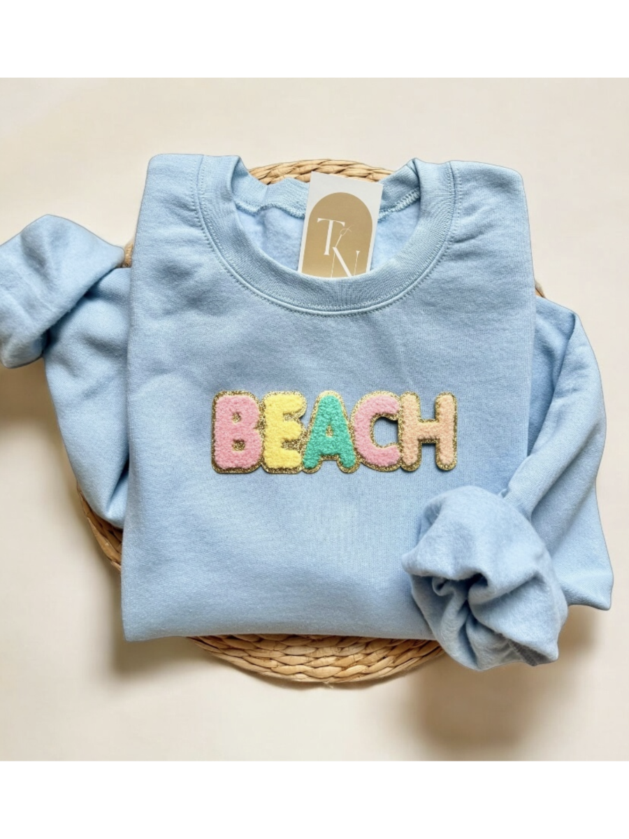 Chenille Patch Beach Sweatshirt on Blue - by Threads And Needles, INC.®
