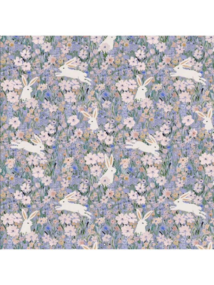 Whimsical fabric pattern with white rabbits leaping through a dense field of purple, pink, and blue watercolor wildflowers.