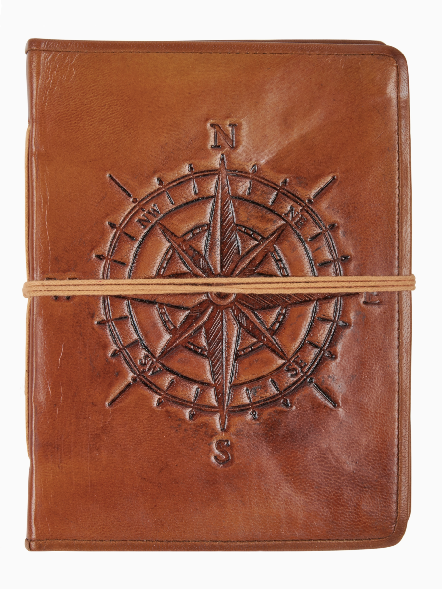 Brown leather notebook with compass design and string closure on a white background