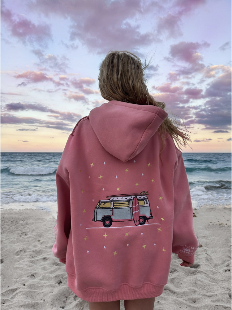 Cozy hoodie featuring a detailed embroidery of a travel van under a starry sky, perfect for a whimsical, adventure-focused slow-living style.