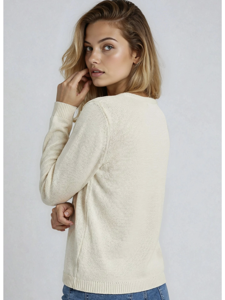 Cozy V-neck sweater featuring delicate colorful floral embroidery on the chest and sleeves for a whimsical, handcrafted look.