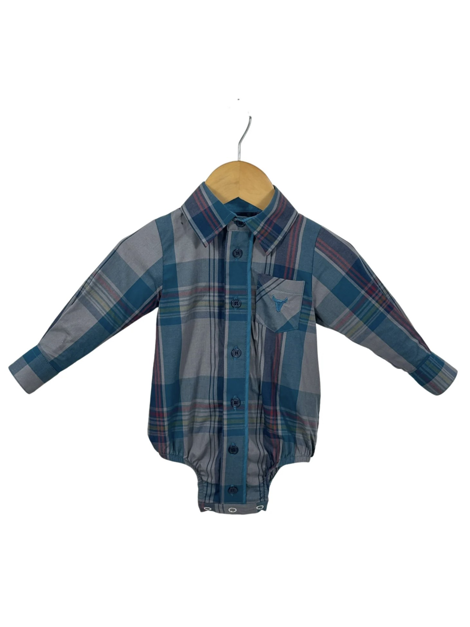 Plaid baby romper on a hanger against a white background