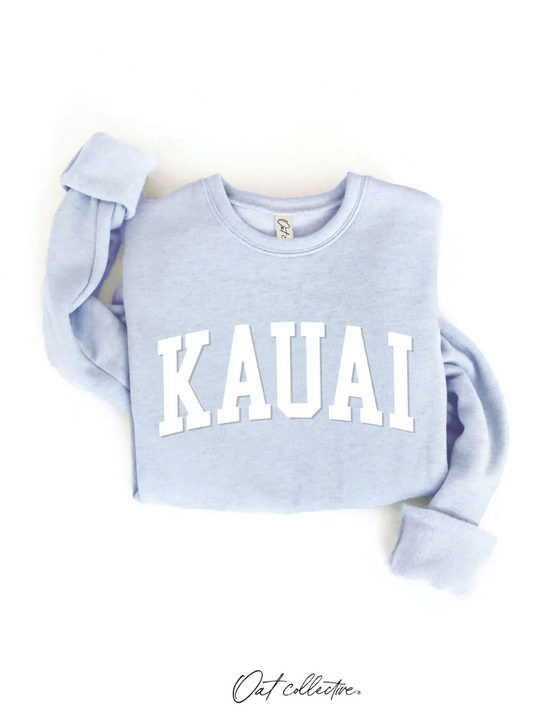 Light blue sweatshirt, with 'Kauai' white word on chest