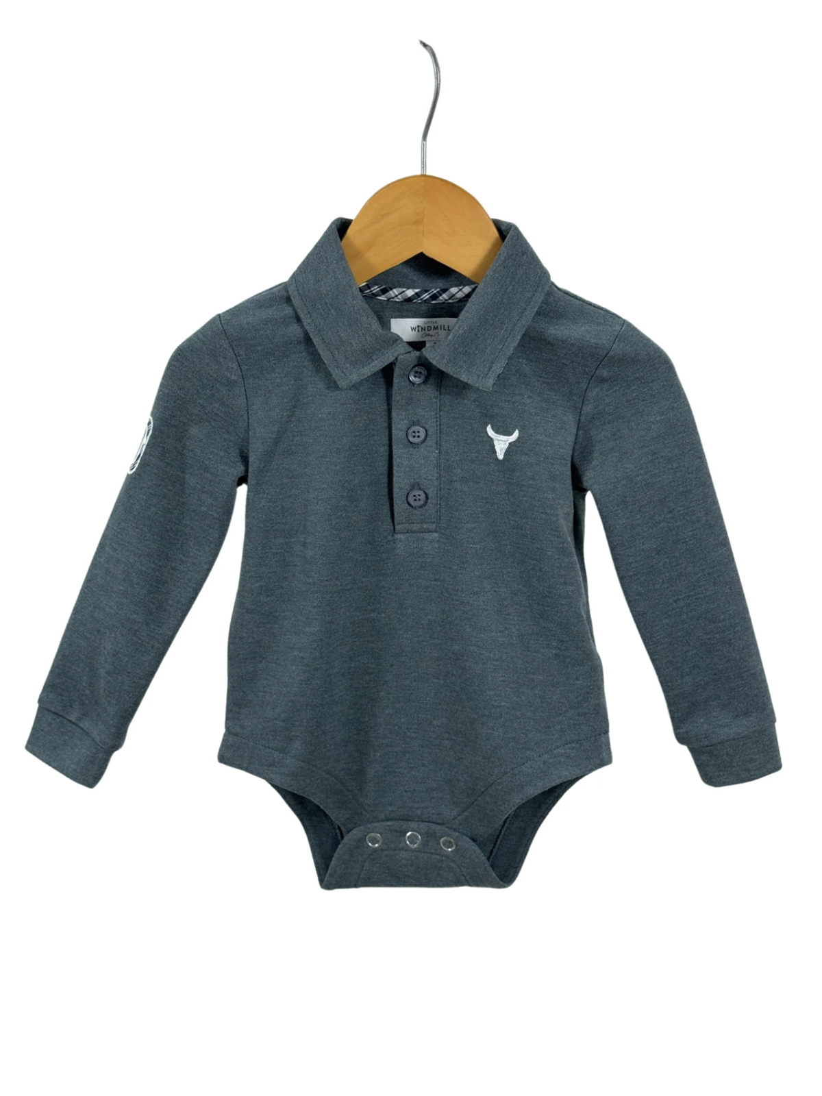 Gray baby polo shirt on a hanger with a white background