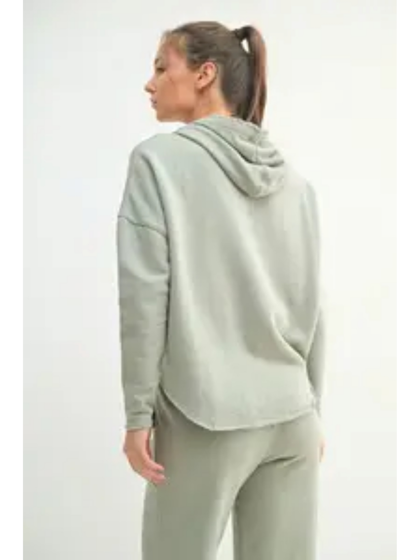 Relaxed-fit hoodie in a faded "Shadow" dark grey color, featuring a minimalist coastal design for an effortless, slow-living aesthetic.