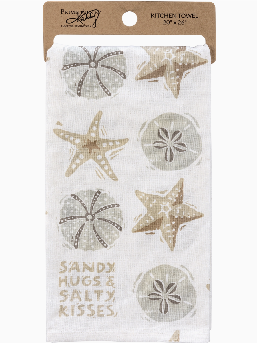 White kitchen towel with tan starfish and sand dollar illustrations and the text "Sandy Hugs & Salty Kisses" in the corner.