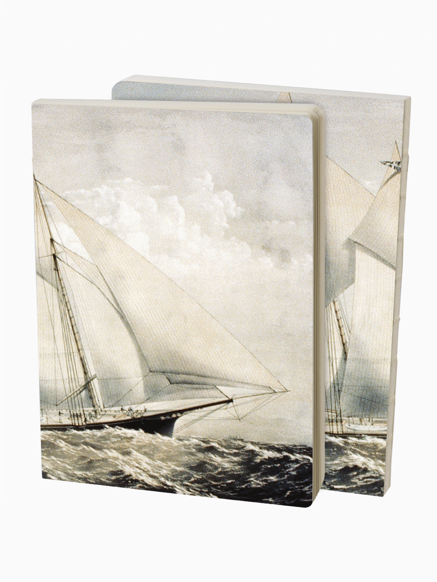 Notebook with sailboat design on a white background